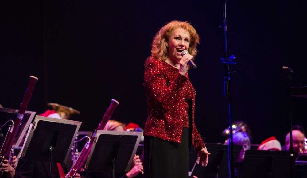 America's Hometown Bands perform "The Joyous Notes of Christmas" on Dec 6 at Emens Auditorium. The concert was introduced by Terry Whitt Bailey, Muncie's Director of Community Development. DN PHOTO KELLEN HAZELIP