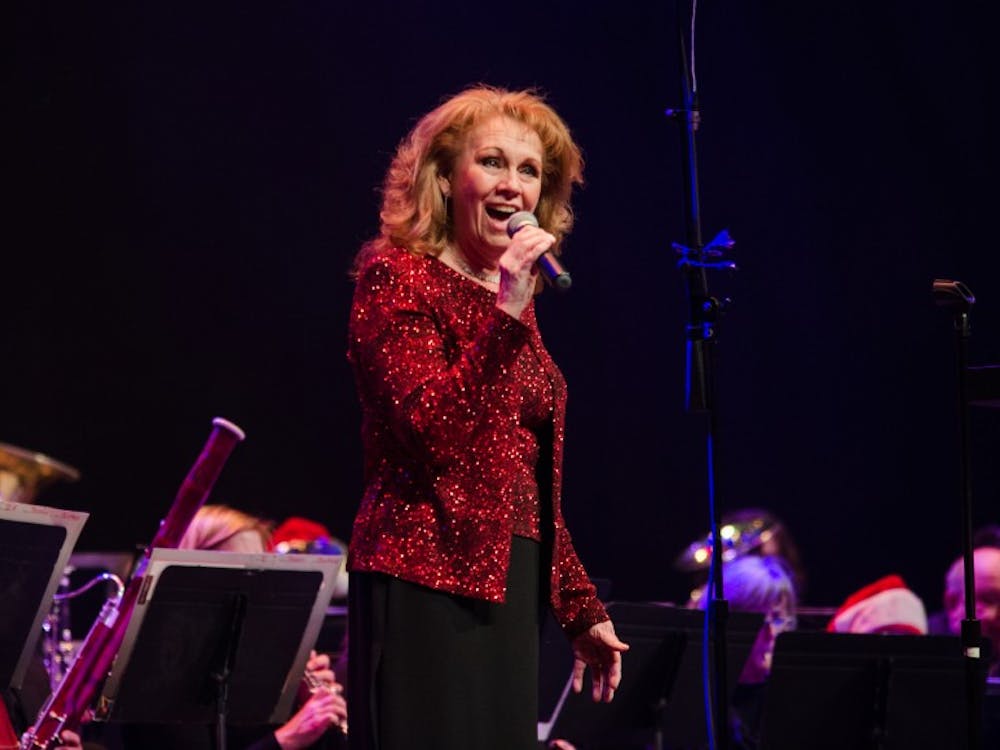 America's Hometown Bands perform "The Joyous Notes of Christmas" on Dec 6 at Emens Auditorium. The concert was introduced by Terry Whitt Bailey, Muncie's Director of Community Development. DN PHOTO KELLEN HAZELIP