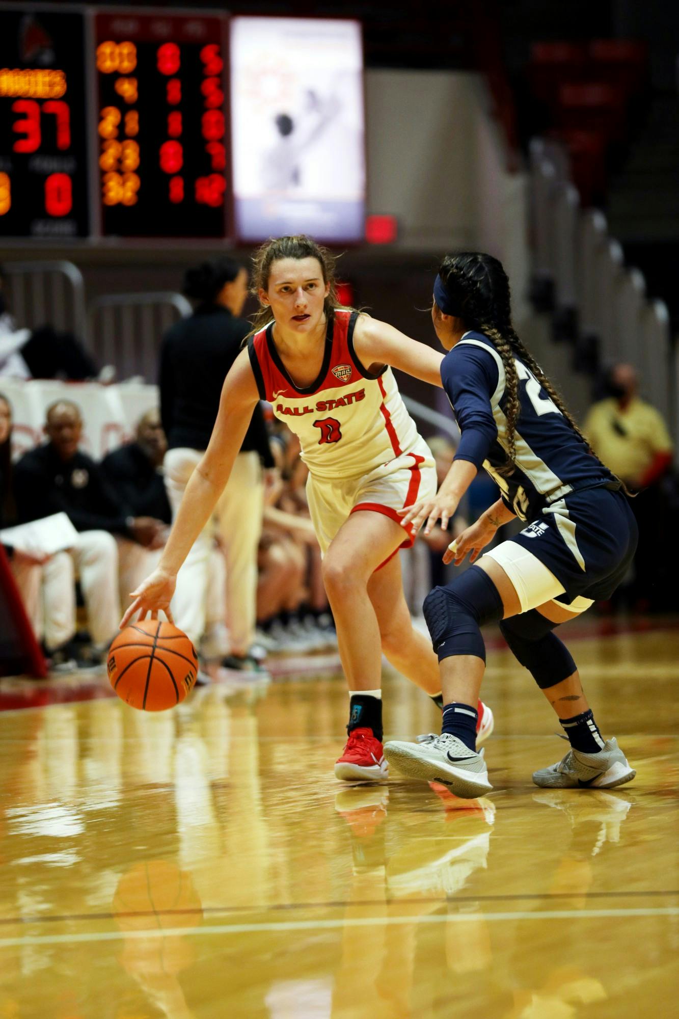 Freshman Ally Becki (0) dribbles the ball down the court against Utah State on Dec. 11, 2021, at Worthen Arena in Muncie, Indiana. Becki had 8 assists throughout the game. Amber Pietz, DN