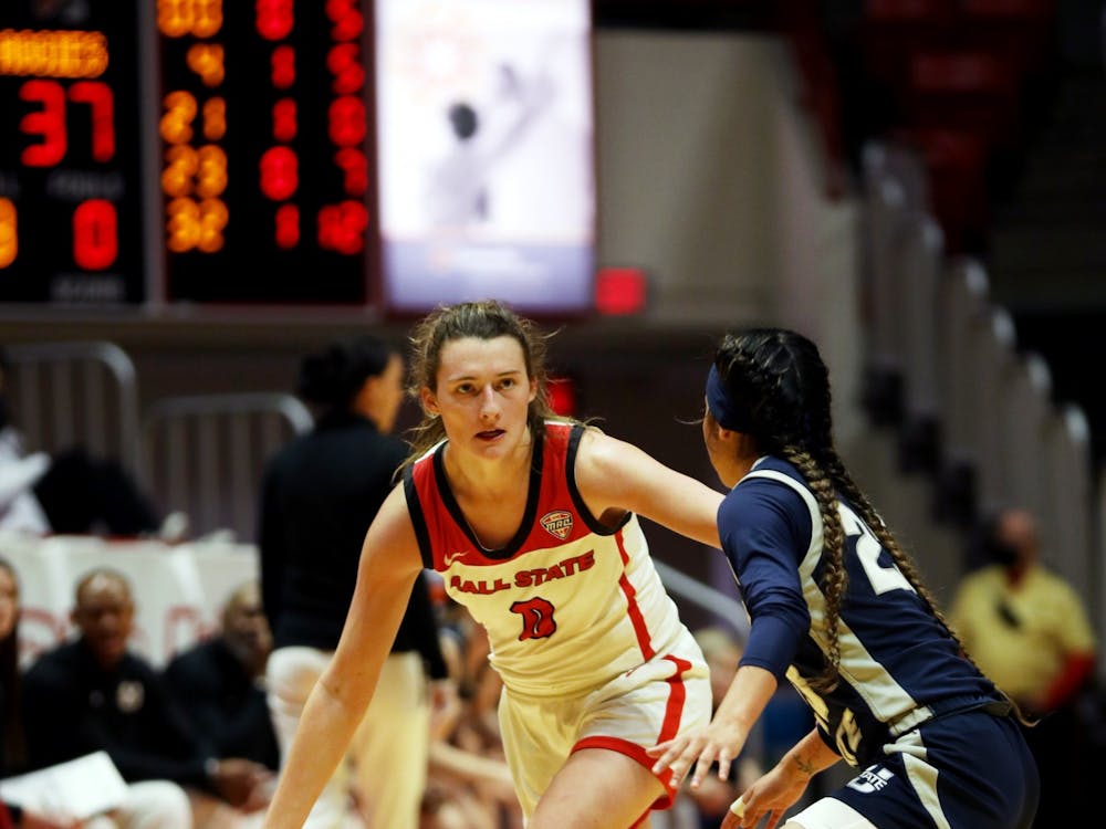 Freshman Ally Becki (0) dribbles the ball down the court against Utah State on Dec. 11, 2021, at Worthen Arena in Muncie, Indiana. Becki had 8 assists throughout the game. Amber Pietz, DN