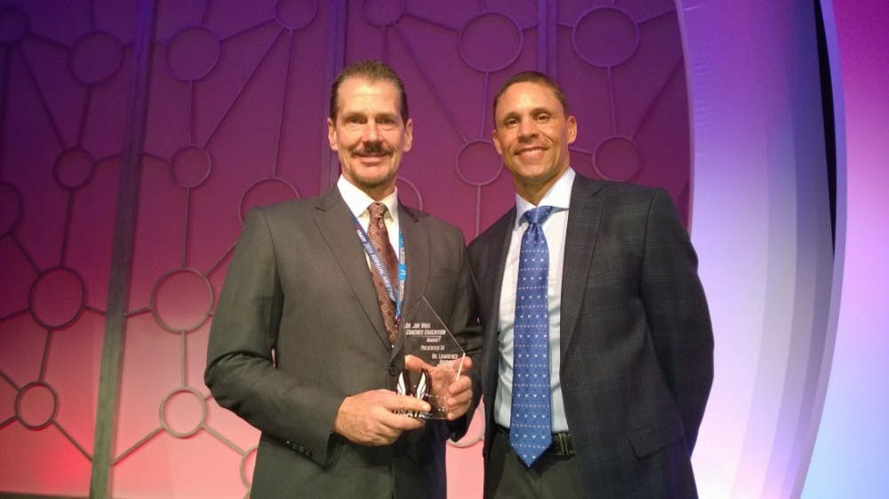 Larry Judge, Ball State associate chairperson and professor in the School of Kinesiology, was awarded the USA Track and Field Joe Vigil Sport Science Award Dec. 3. He received the award at the USATF 2016 Annual Awards Breakfast in Lake Buena Vista, Florida, for being active in the area of sports scholarships and utilizing scientific techniques in his coaching methods. Larry Judge // Photo Provided