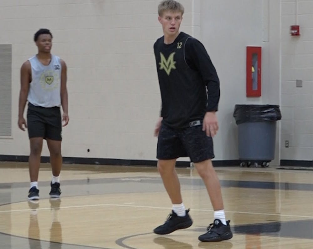  Luke Ertel getting ready to play defense in a drill.