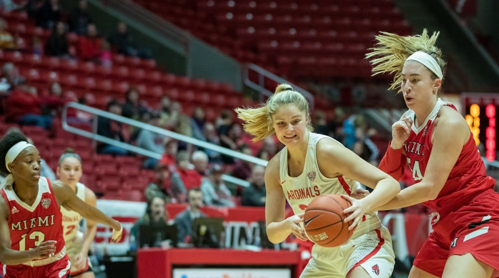 <p>Sophomore guard Blake Smith takes the ball from Junior forward Kelly McLaughlin, Jan. 25, 2020, in John E. Worthen Arena. Smith had eight points for the Cardinals. <strong>Jacob Musselman, DN</strong></p>