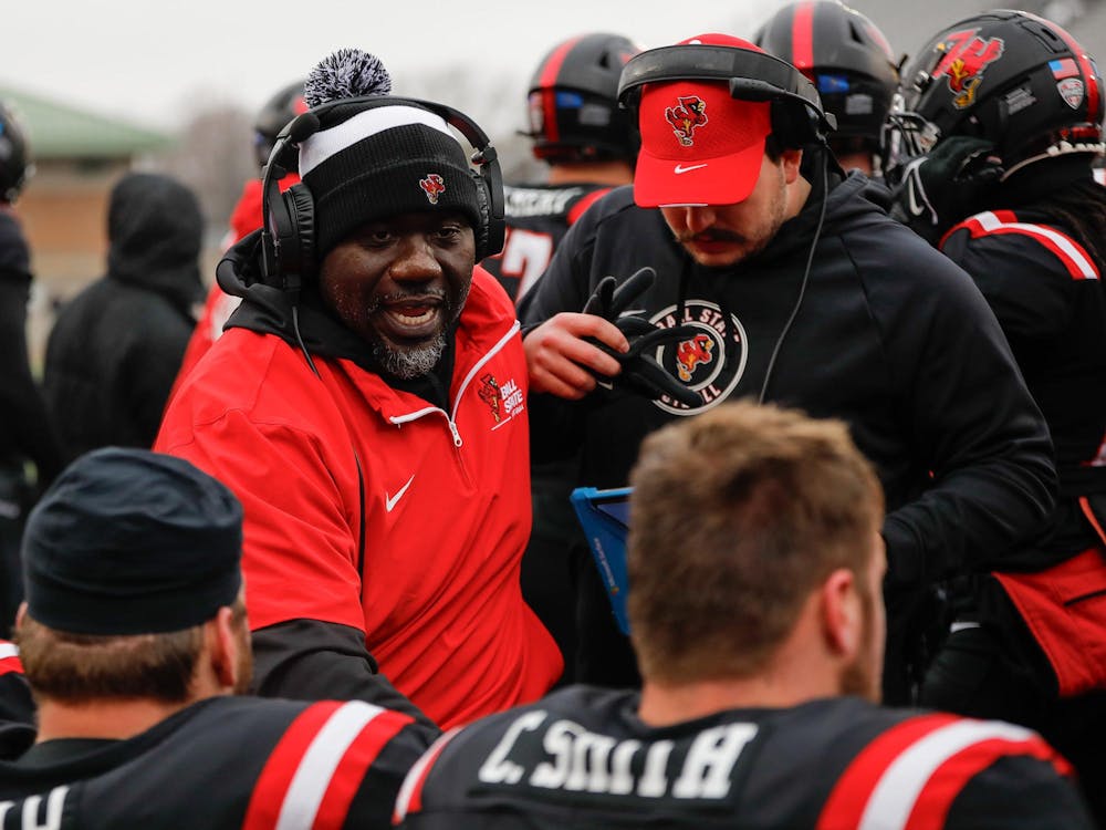 Ball State interim head coach checks on his players between drives while facing Bowling Green Nov. 23 at Scheumann Stadium. Ball State fell to Bowling Green 38-13. Andrew Berger, DN