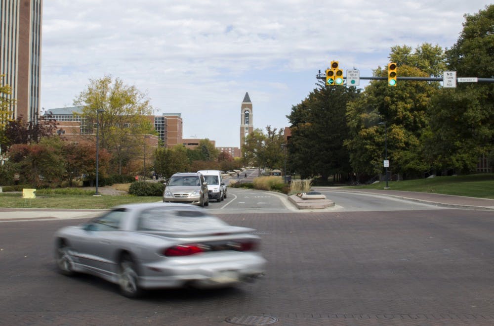 The university began work to install a left turn arrow at the Scramble Light on Oct. 10, according to a university email. Drivers on Riverside or McKinley avenues will be able to turn left under the protected arrow now. DN PHOTO EMMA ROGERS