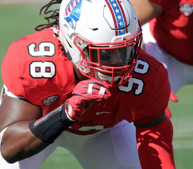 Ball State redshirt senior defensive end Anthony Winbush lines up on the line of scrimmage during the Cardinals’ game against UAB on Sept. 9 at Scheumann Stadium. Winbush had three solo tackles. Paige Grider, DN