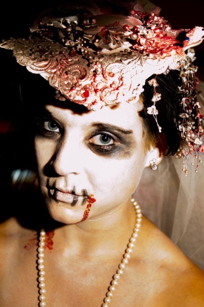 Students clad in costumes partied in the Student Center Friday Oct. 25, 2013. DN FILE PHOTO TAYLOR IRBY