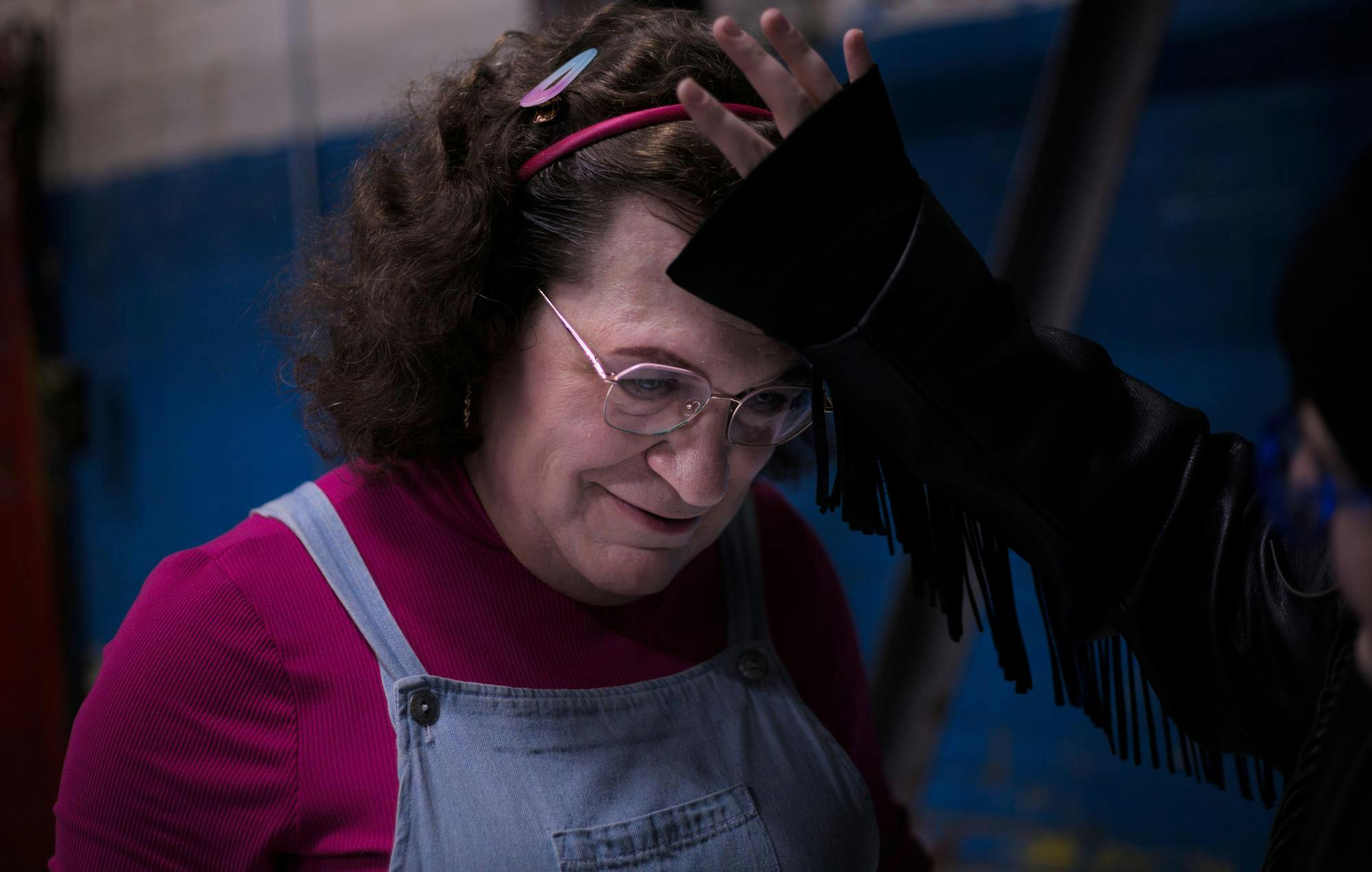 Darlene Hollingsworth has her hair fixed by Freedom (last name not provided) in MadJax, November 11th, 2024. Hollingsworth and Freedom attended the vigil together Jeffrey Dreyer, DN