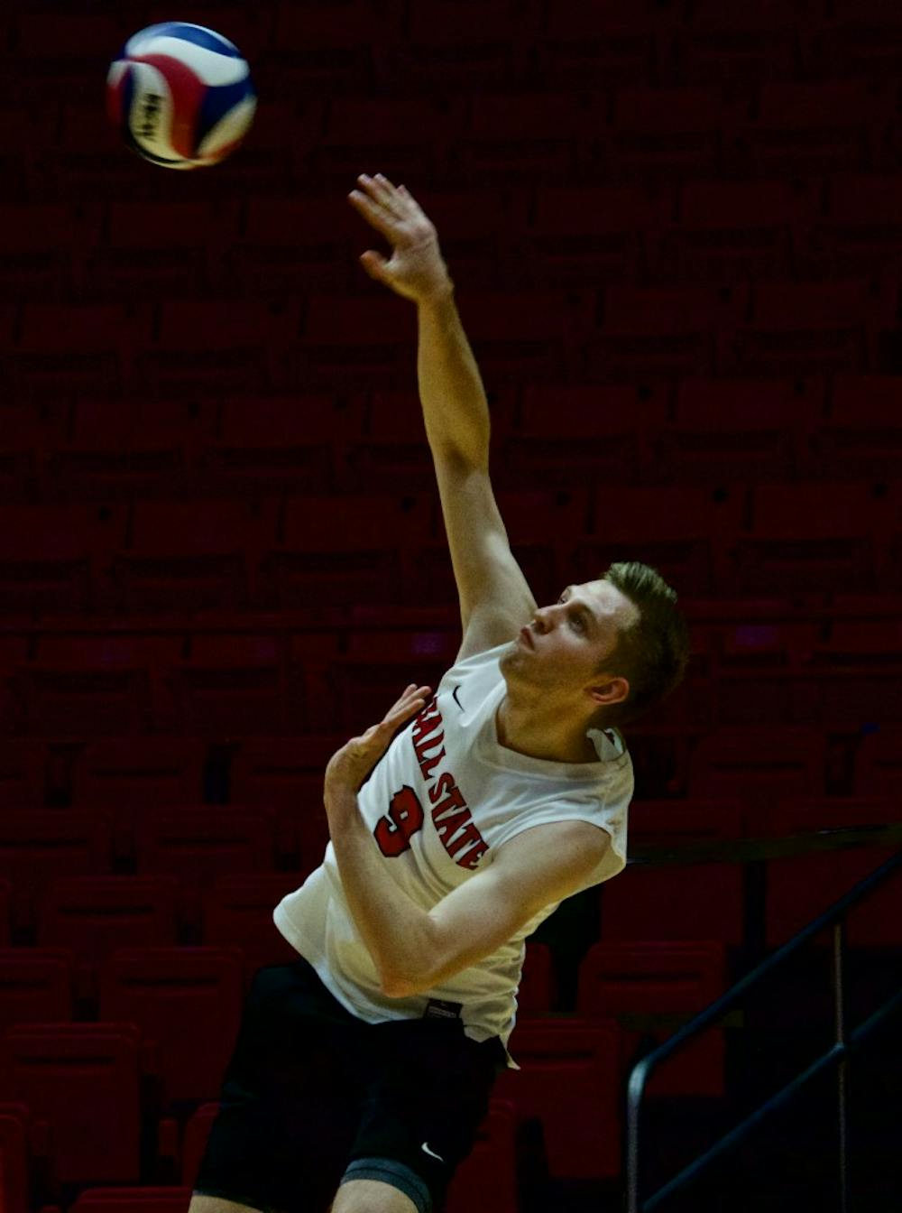Junior Parker Swartz serves the ball for the Cardinals against Quincy on March 31 at John E. Worthen Arena. Ball State won three games in a row. Rebecca Slezak, DN