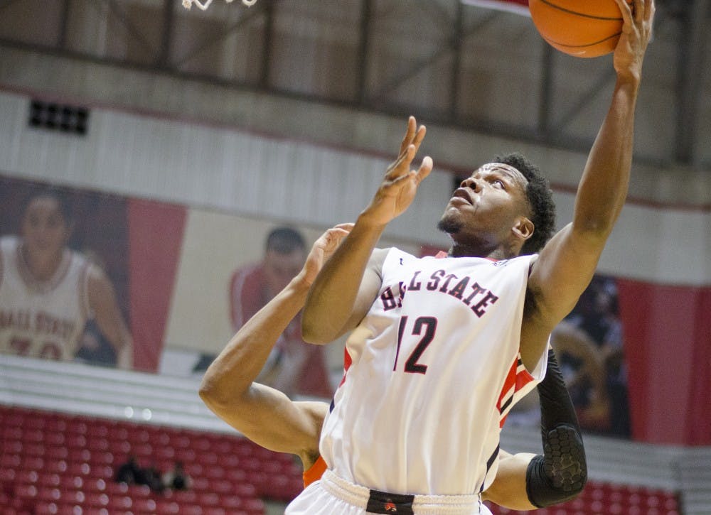Junior forward Bo Calhoun goes up for a shot during the game against Bowling Green on Feb. 14 at Worthen Arena. DN PHOTO BREANNA DAUGHERTY