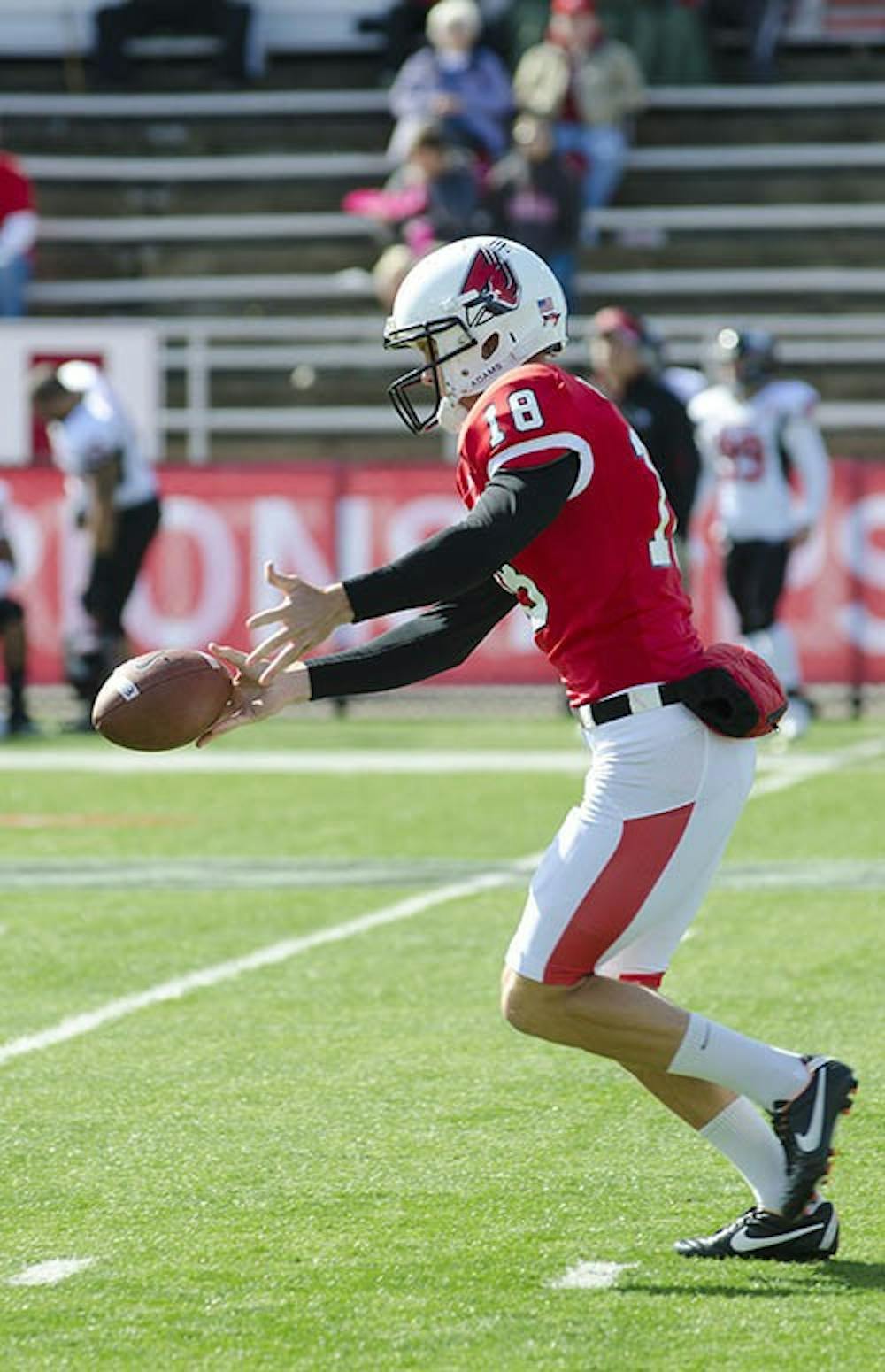 Former Ball State punter Scott Kovanda kicks the ball to Northern Illinois during the game against the Huskies on Oct. 6. Kovanda recently participated in the NFL Scouting Combine in preparation for the 2013 NFL Draft. DN FILE PHOTO COREY OHLENKAMP