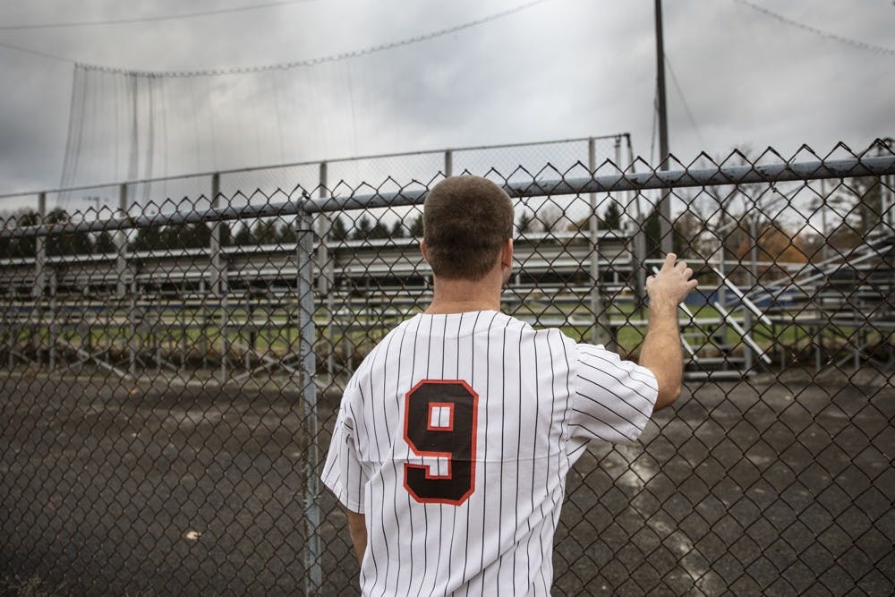 Zach Piatt stands outside the McCulloch Park baseball dimond Nov. 6, 2018. Piatt played his last season of baseball in 2017. Rebecca Slezak,DN