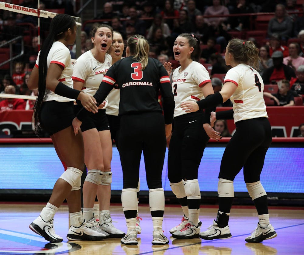 Ball State women's volleyball celebrates scoring a point against Northern Illinois Nov. 10 at Worthen Arena. The Cardinals won 3-1 against the Huskies. Mya Cataline, DN