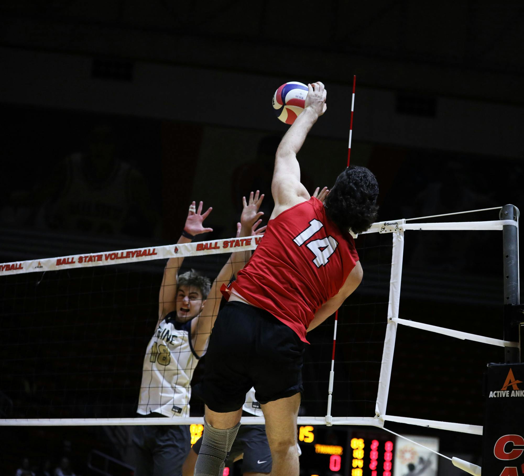 Senior opposite hitter Dyer Ball spikes the ball against Trine University Jan. 16 at Worthen Arena. Ball scored 14 points in the game. Mya Cataline, DN