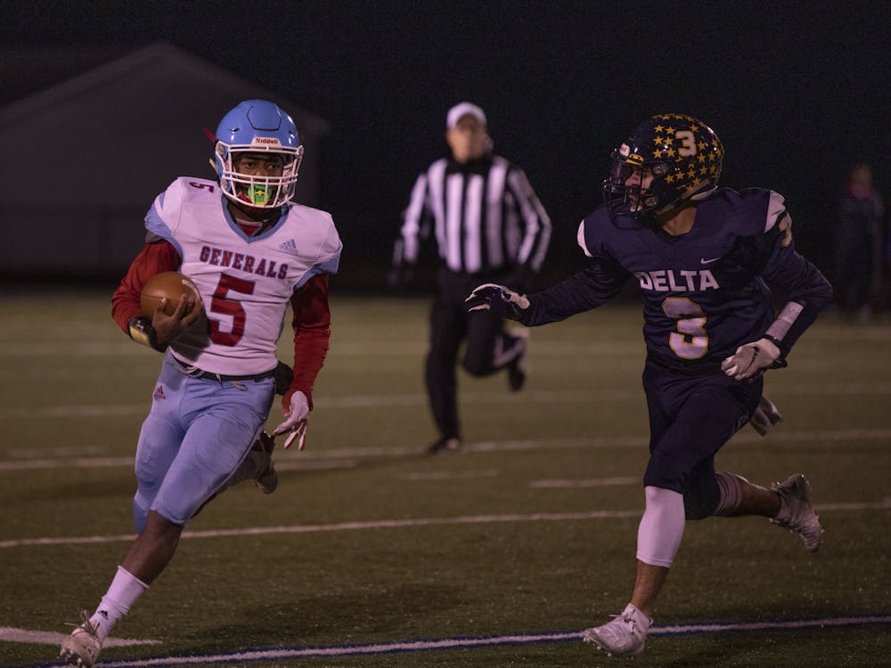 Wayne Generals' junior quarterback and slotback Shawn Collins runs the ball vs. Delta Oct. 30, 2020, at Delta High School. The Eagles defeated the Generals 49-18. Connor Smith, DN.