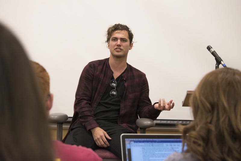 Kevin Ray, bass player for Walk the Moon, visits Ball State University on April 20, in the Letterman Building room 125 to talk about his experiences before and after entering into the music business. DN PHOTO STEPHANIE AMADOR