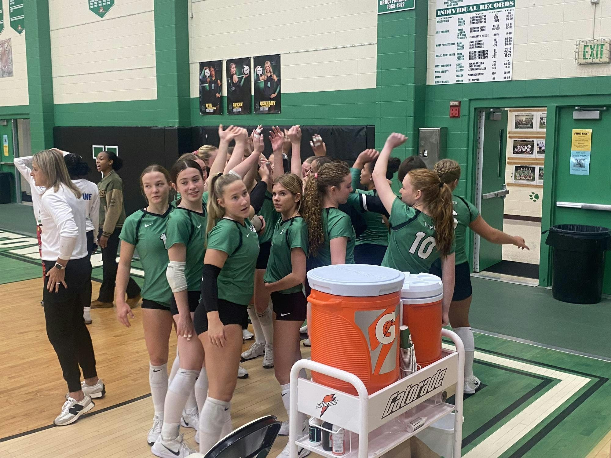 The Yorktown Tigers huddle up before taking the court, focused and ready to bring their energy. The Tigers looked locked in as they prepared for another competitive home matchup.
