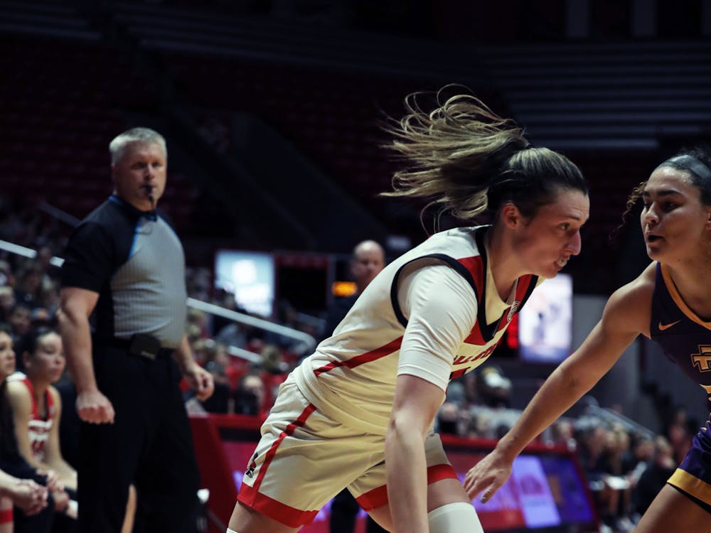 Junior Ally Becki dribbles the ball towards the net against Tennessee Tech Nov. 6 at Worthen Arena. Becki scores 16 points in the game. Mya Cataline, DN