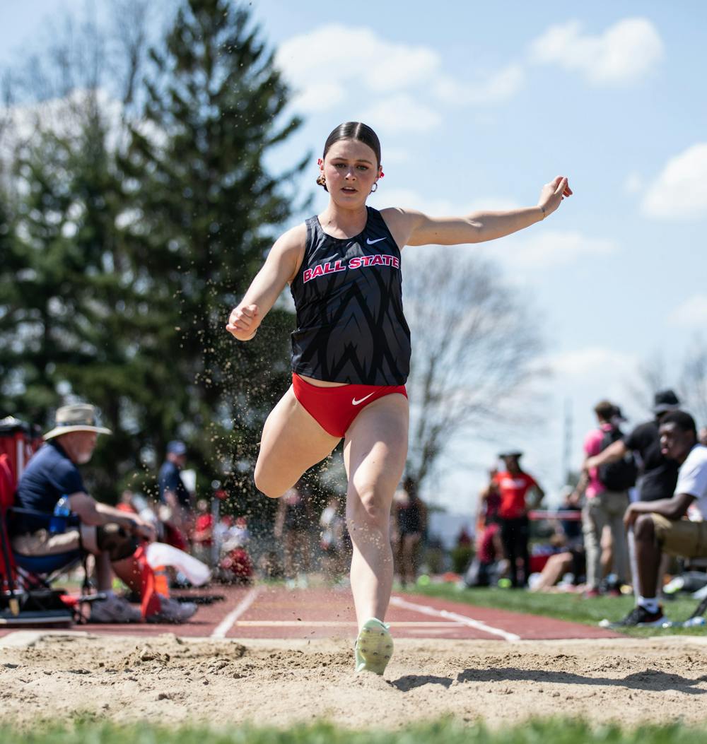 First-year sprinter Lindley Steele runs through long jump at the Ball State Track and Field We Fly Challenge on April 15 at the University Track at Briner Sports Complex. Katelyn Howell, DN.