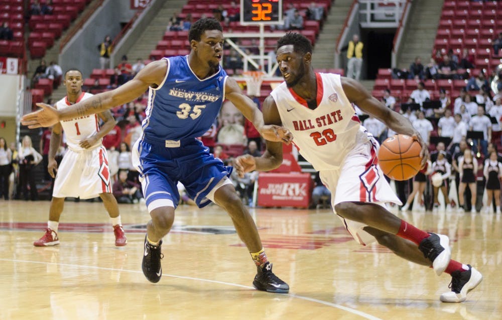 Senior forward Chris Bond drives the ball past a Buffalo player Jan. 23 at Worthen Arena. Bond scored 16 points. DN PHOTO BREANNA DAUGHERTY