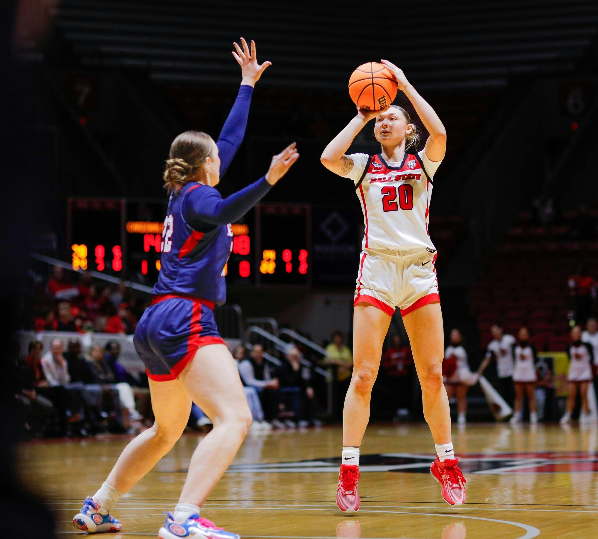 Junior Alex Richard shoots the ball for two against Belmont March 21 at Worthen Arena. Richard had five points in the game. Andrew Berger, DN