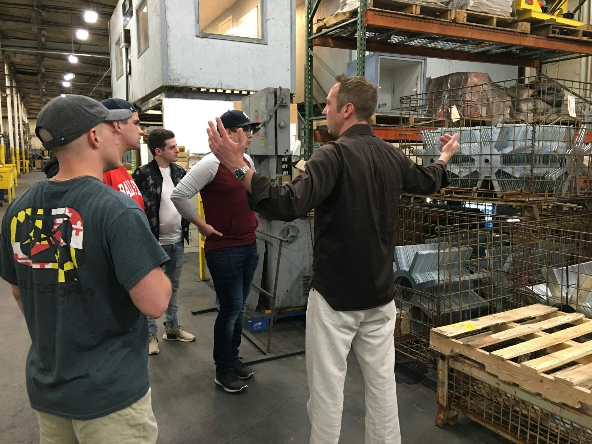 John Smith, president of the industrial division at Mid-West Metal Products, talks to students in the MadJax studio fall 2019. Mid-West Metal Products is based in Muncie and provided materials for the Minnetrista farmers market project. Kevin Klinger, Photo Provided