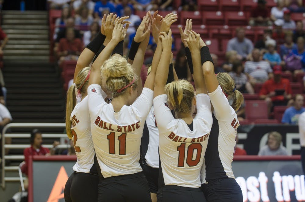 The women's volleyball team meets in a circle before the start of the game against Western Illinois on Aug. 29 at Worthen Arena. DN PHOTO BREANNA DAUGHERTY
