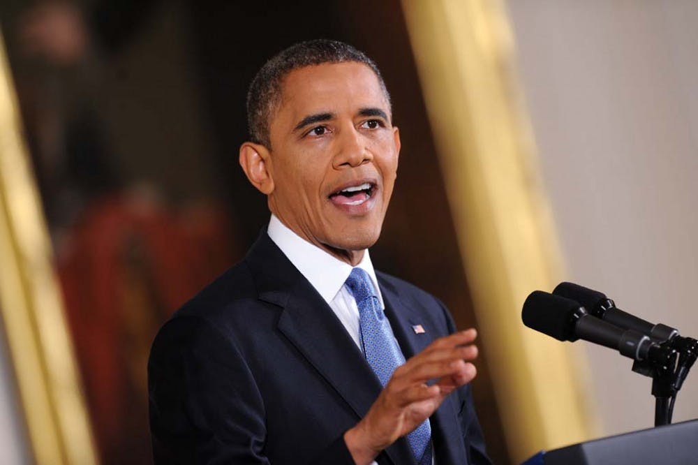 U.S. President Barack Obama speaks during his first press conference after being re-elected in the East Room of the White House on Wednesday. Obama is set to travel to Myanmar in a three-country tour through Asia. MCT PHOTO