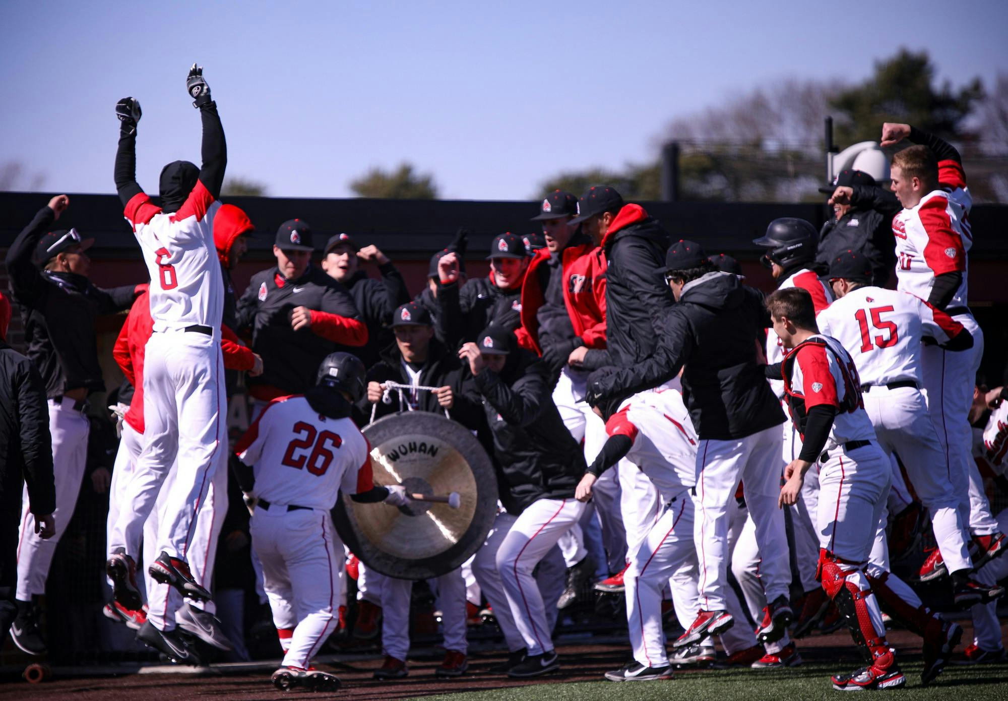 Junior infielder Zach Lane hits a gong in celebration of the first homerun of the game against Eastern Michigan March 13 at Ball Baseball Diamond. Lane had 3 hits and 3 RBI&#x27;s for the Cardinals. Jacy Bradley, DN
