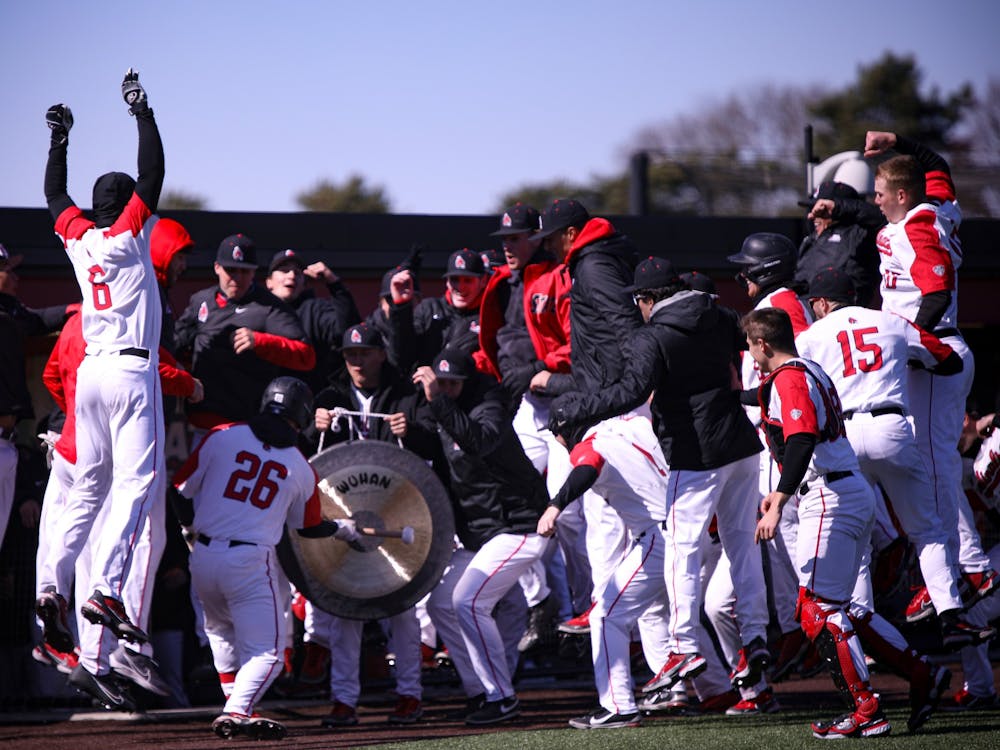 Junior infielder Zach Lane hits a gong in celebration of the first homerun of the game against Eastern Michigan March 13 at Ball Baseball Diamond. Lane had 3 hits and 3 RBI&#x27;s for the Cardinals. Jacy Bradley, DN