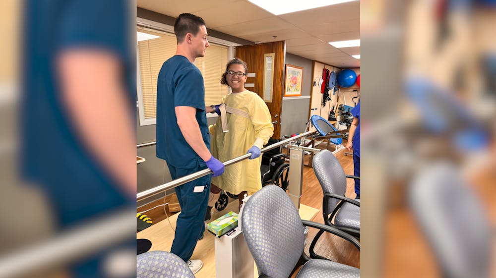 Muncie woman walking again after being run over during mass shooting