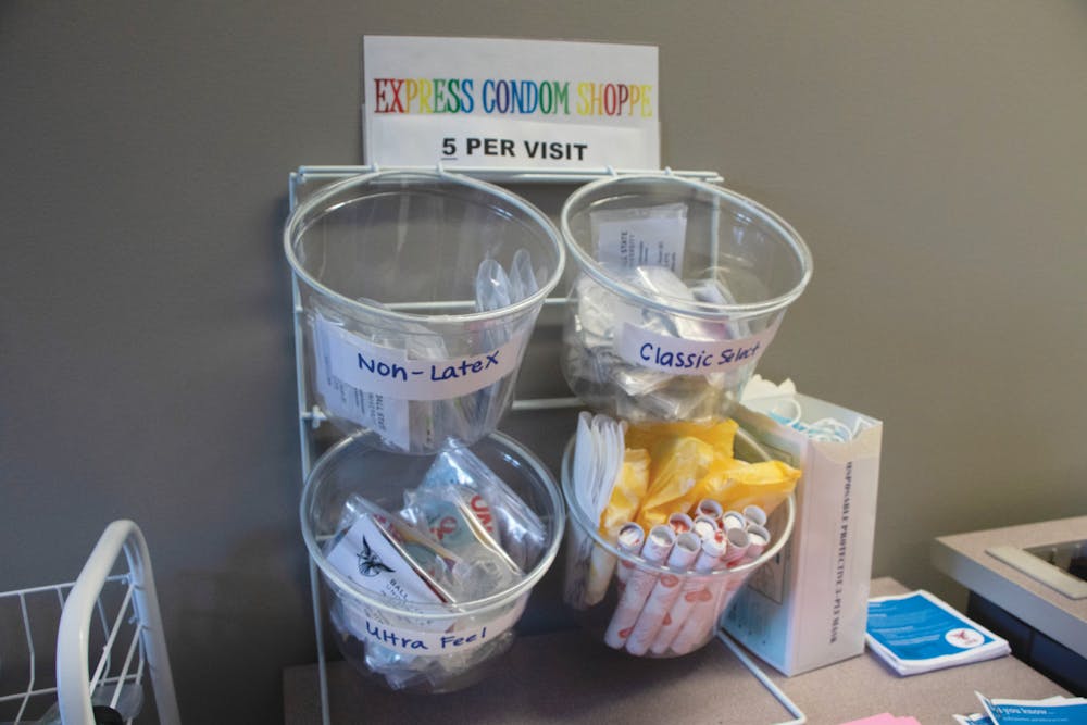 Bowls of tampons, pads and condoms sit on a table in the Relaxation room in Lucina Hall on Sept. 1. The menstruation stations are an initiative from Health Promotions and Advocacy. Olivia Ground, DN
