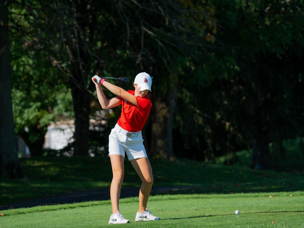 First year Sarah Gallagher swings the club from the tee box at the Cardinal Classic at the Players Club Sept. 20. Gallagher scored one under for the day. Eli Pierson, DN