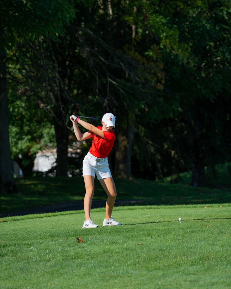 First year Sarah Gallagher swings the club from the tee box at the Cardinal Classic at the Players Club Sept. 20. Gallagher scored one under for the day. Eli Pierson, DN