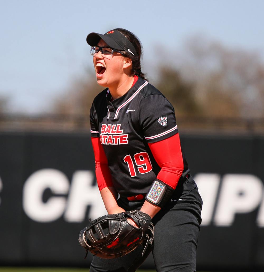 <p>Graduate student infeilder Samantha-Jo Mata yells for a strike against Bowling Green April 13 at First Merchants Ballpark Complex. Mata had six put-outs in the field. Andrew Berger, DN</p>