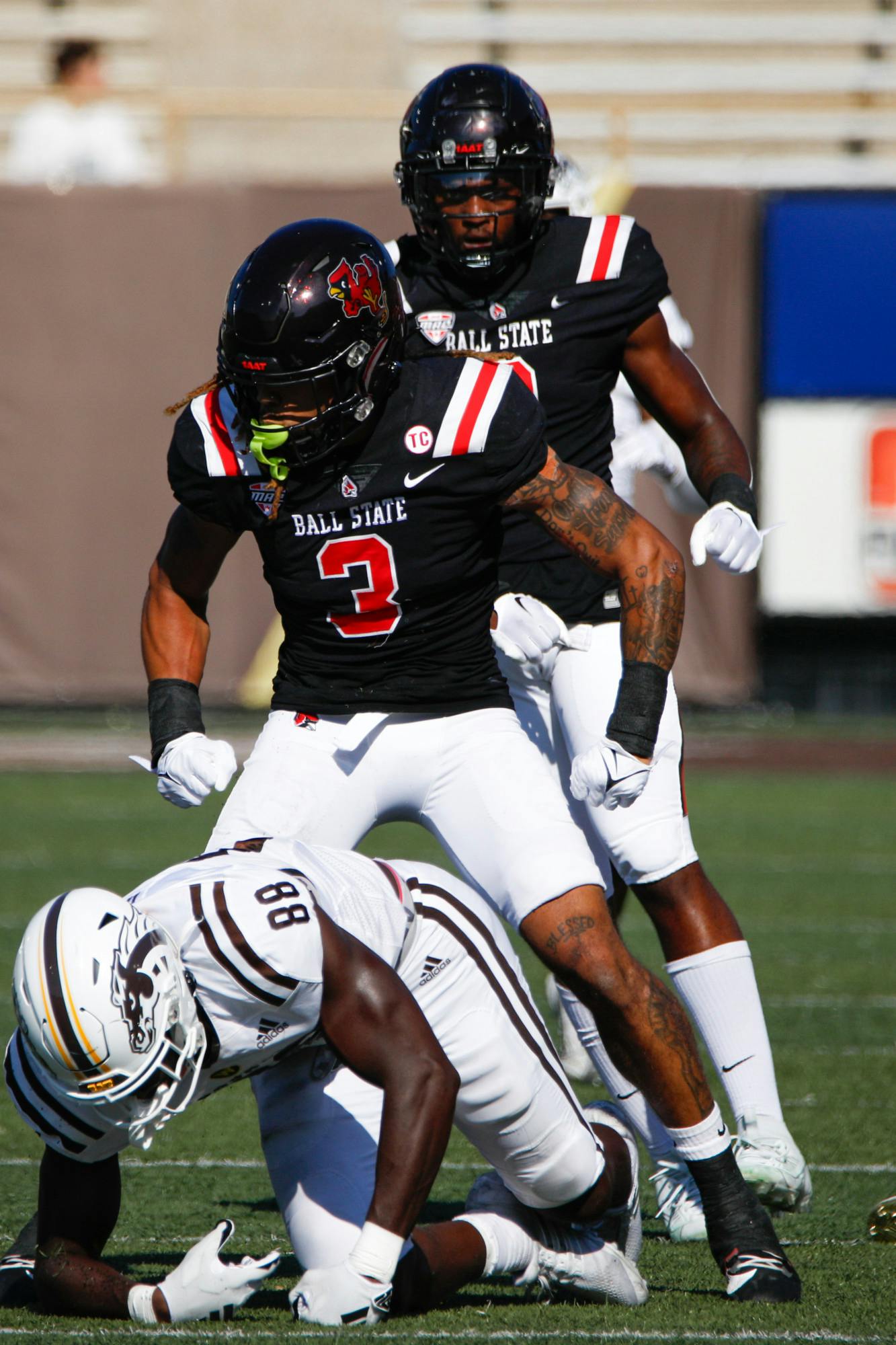 Junior defensive back Jordan Riley celebrates a tackle in a game against Western Michigan Sept. 30 at Waldo Stadium in Kalamazoo, Michigan. The Cardinals fell 42-24 in their MAC opener. Daniel Kehn, DN