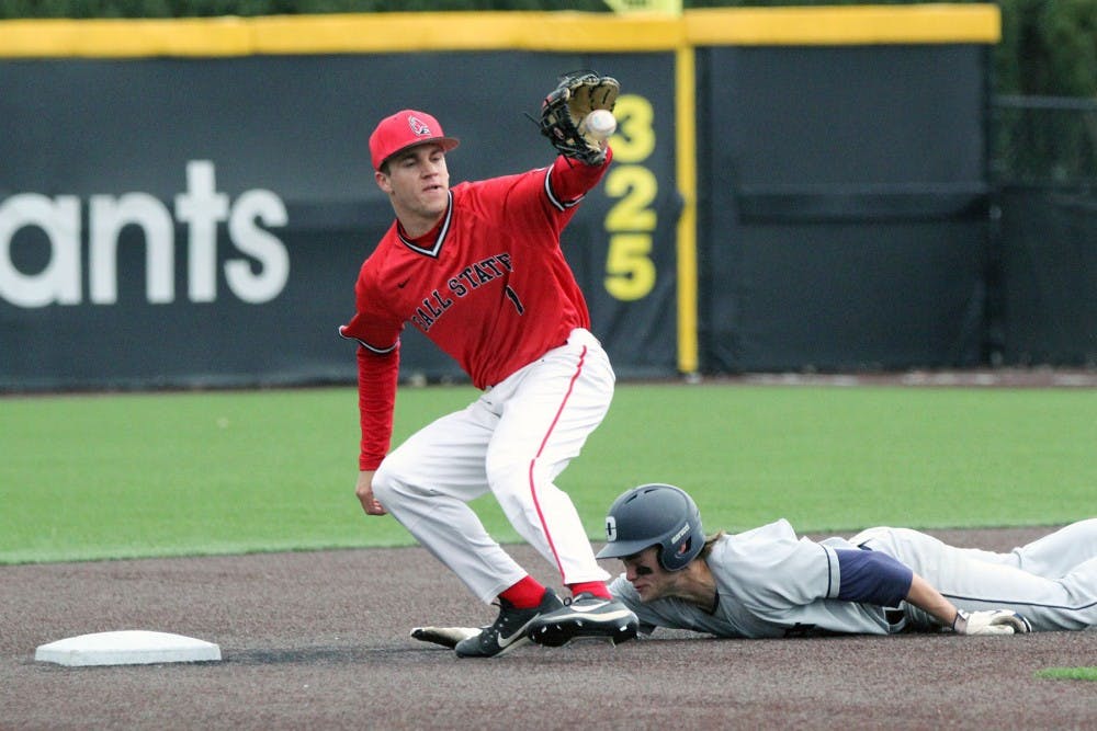 Second baseman Seth Freed attempts to get a Dayton runner out at second during the Cardinals’ game against the Flyers on March 18 at Ball Diamond at First Merchants Ballpark Complex. Paige Grider, DN File