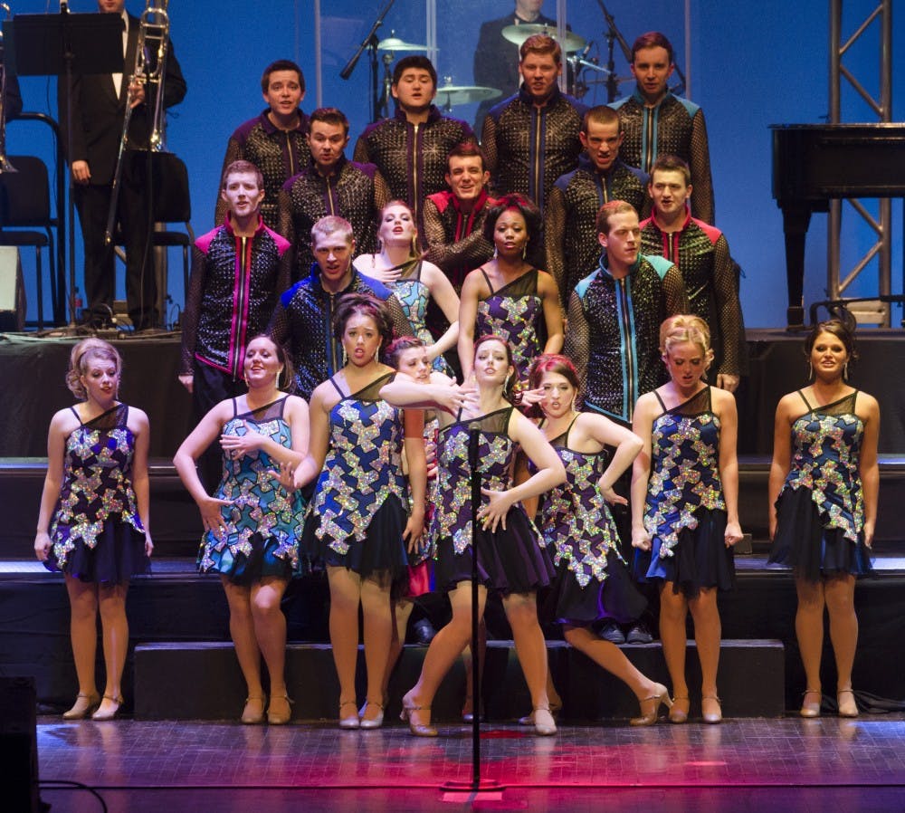 The Ball State University Singers perform at the 50th Annual Spectacular on April 12 at the John R. Emens Auditorium. Ball State University Singers alumni also performed during the event. DN PHOTO BREANNA DAUGHERTY 