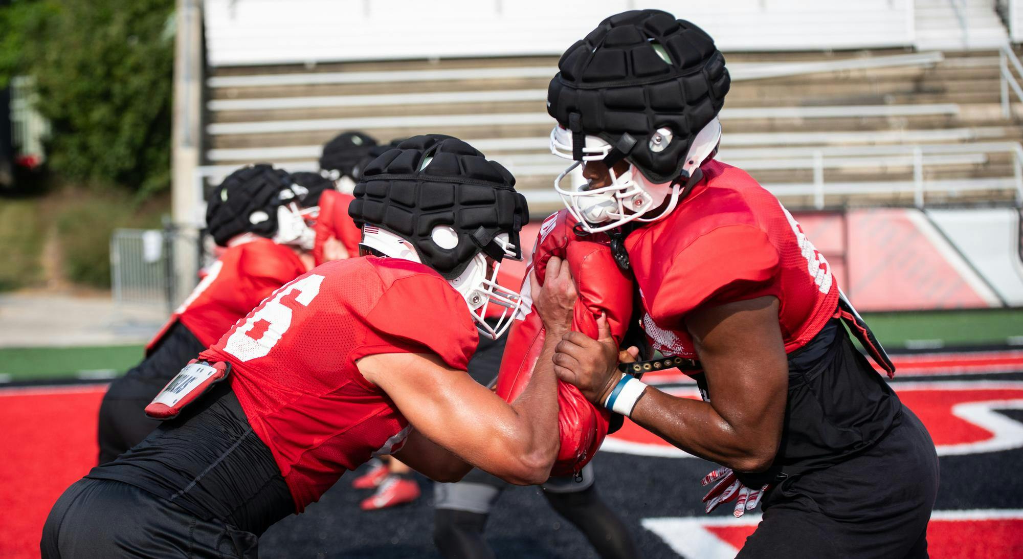 Ball State football linemen prepare to run drills during practice Aug. 19 at Scheumann Stadium. Ball State will play its first game of the season at Purdue on Aug. 30. Andrew Berger, DN