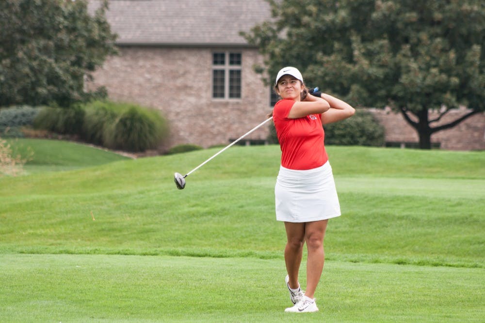 Women's golf sophomore Manon Tounalom tees off at hole nine during the Cardinal Classic on Sept. 19 at Players Club Woodland Trails. There were 19 teams competing in the tournament. Kaiti Sullivan, DN