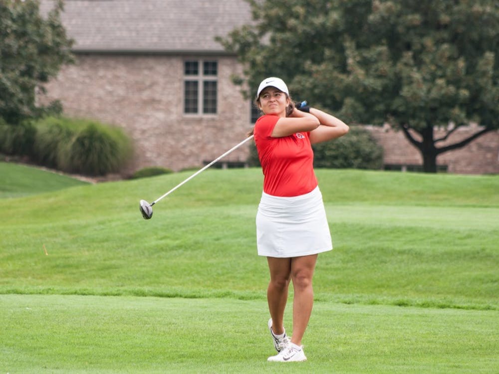 Women's golf sophomore Manon Tounalom tees off at hole nine during the Cardinal Classic on Sept. 19 at Players Club Woodland Trails. There were 19 teams competing in the tournament. Kaiti Sullivan, DN