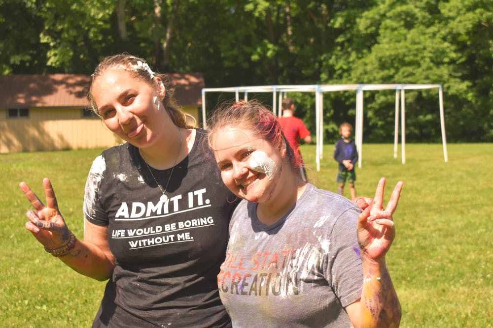 <p>Kelly Hayes (left) and Brenna Sealy (right) in the “Messy Olympics” during a session of the Camp Kesem summer camp. Kelly Hayes, Photo Provided</p>