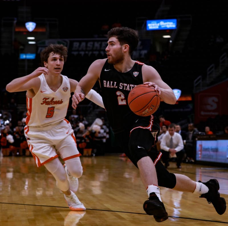 Redshirt senior guard Tyler Persons dribbles the ball up the court at Quicken Loans Arena in Cleveland, Ohio, March 14, 2019. Persons led the Cardinals in scoring and assists. Rebecca Slezak,DN