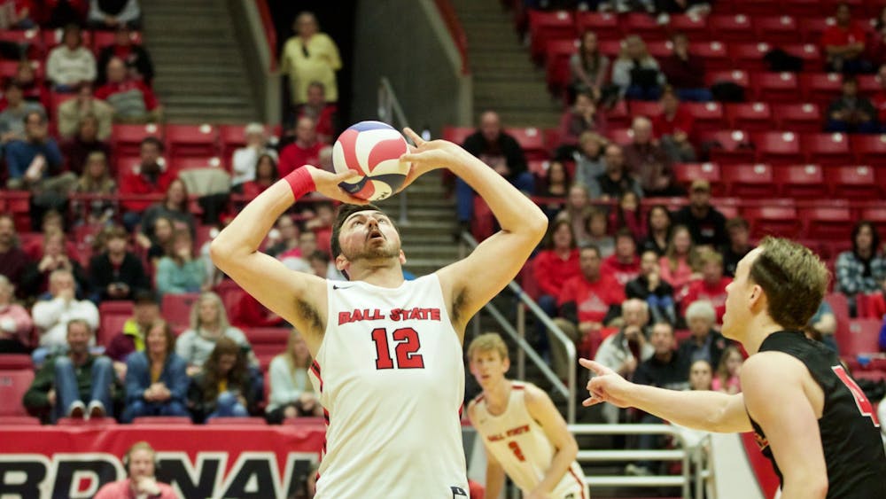 Senior setter Jake Romano sets the ball Jan. 11 in John E. Worthen Arena. In the Cardinals' second and final match of the Active Ankle Challenge, Ball State swept Queens. Jacob Musselman, DN