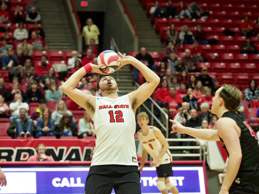 Senior setter Jake Romano sets the ball Jan. 11 in John E. Worthen Arena. In the Cardinals' second and final match of the Active Ankle Challenge, Ball State swept Queens. Jacob Musselman, DN