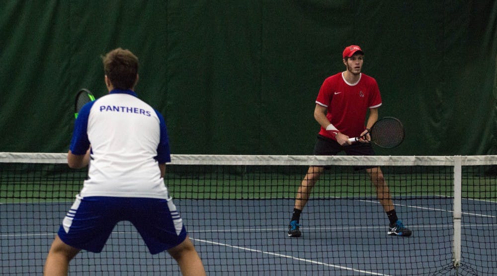 Ball State tennis players Lucas Andersen and Andrew Stutz play against Eastern Illinois players Freddie O'Brien and Gage Kingsmith in the match on Jan. 22 at Muncie's Northwest YMCA. The Cardinals won 6-2.  Grace Ramey // DN