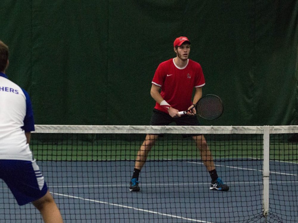 Ball State tennis players Lucas Andersen and Andrew Stutz play against Eastern Illinois players Freddie O'Brien and Gage Kingsmith in the match on Jan. 22 at Muncie's Northwest YMCA. The Cardinals won 6-2.  Grace Ramey // DN