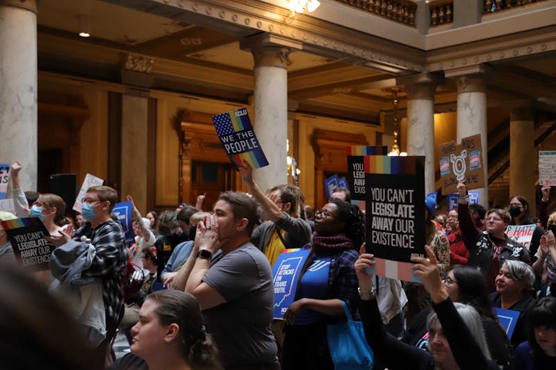 Attendees of the ACLU Rally to Protect Trans Youth gather to chant at the Indiana State House on April 1. The rally was held in relation to SB 480. Olivia Ground, DN 
