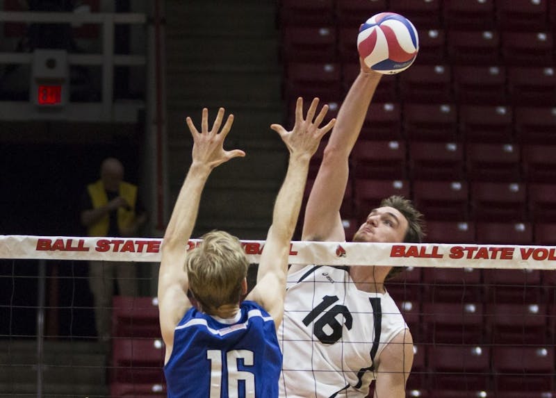Middle attacker Matt Walsh reaches for a kill in the second set against Fort Wayne at Worthen Arena on Feb. 7. The Cardinals won 3-0.&nbsp;Grace Hollars // DN File