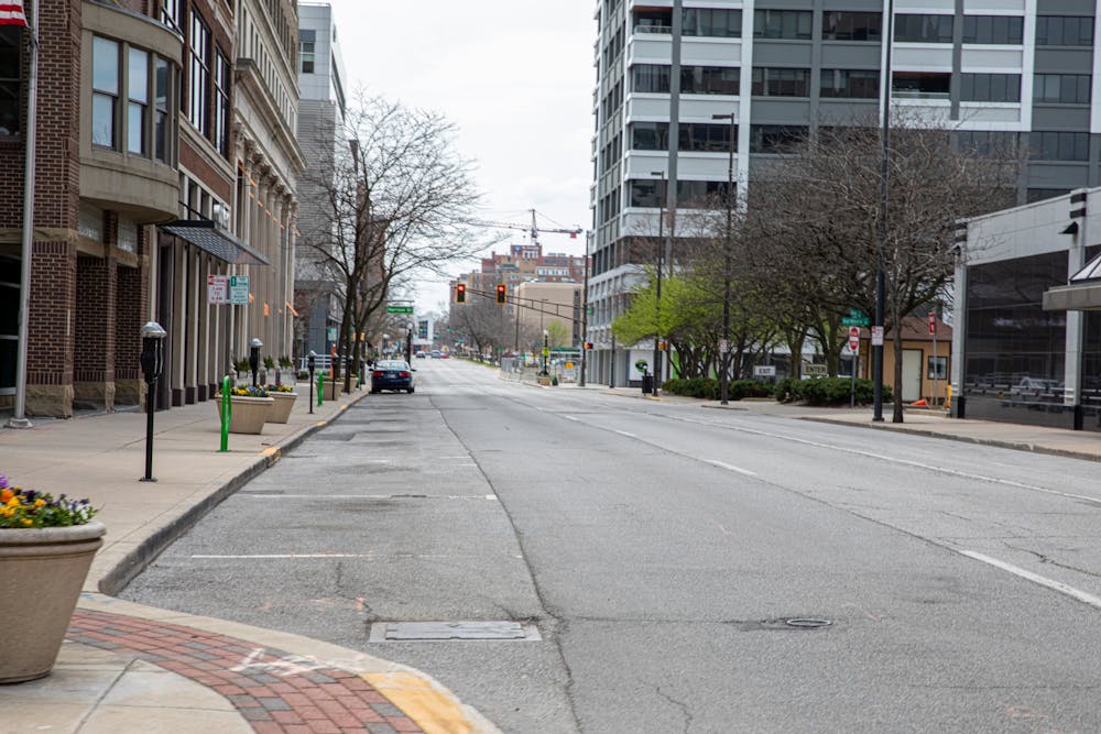 The street stands empty April 18, 2020, in Fort Wayne, Ind. Indiana’s stay-at-home order has affected communities all around the state, with businesses closing, many people have lost their job. Jacob Musselman, DN